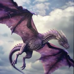 a purple dragon flying through the air with clouds in the backgrounnds