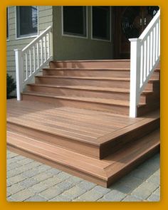 the steps are made of wood and have white railings