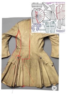 an old dress with red lines on it and the sewing pattern is cut in half