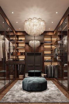 an image of a walk in closet with chandelier