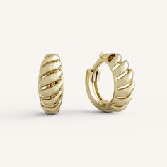 Annie Hoops feature a dome shaped hinged hoop with gold detail and negative space. Modern Yellow Gold Hinged Huggie Earrings, Modern Small Hoop Hinged Huggie Earrings, Modern Hinged Small Hoop Huggie Earrings, Negative Space, Gold Details, Types Of Metal, Yellow Gold, Yellow, Gold