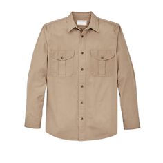 This shirt brings back an iconic fabric from our 1980s archives in the same cut as our iconic Alaskan Guide Shirt. The Safari Cloth fabric is a cotton canvas with an exceptionally tight weave, once used for jackets on safaris for protection against aggressive insects. The material withstands abrasion and is nearly impervious to wind. The fabric starts out a bit stiff and will soften with wear and washings. The tight weave provides excellent durability and allows debris such as sawdust and wood chips to brush off with ease. The center-back box pleat along with the relaxed cut provide ease of motion. Button-secure front closure and adjustable cuffs. Spread collar. Shirttail hem. | Filson Safari Cloth Guide Shirt Size SmallafariKhak Size Small Wood Chips, Cloth Fabric, Hunting Shirts, Box Pleats, Work Shirts, Needle And Thread, Cotton Canvas, Insects, Hunting