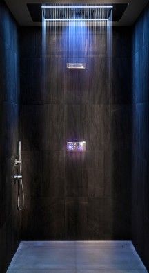 a shower with blue light coming from it