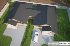 an aerial view of a house with two cars parked in the driveway