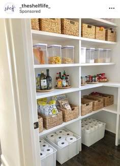 an organized pantry with white shelving and baskets