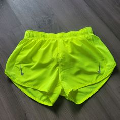 Dri-Fit Running Shorts From Nike In Neon Green-Yellow. Women's Size Small. Nwot. Stretch Yellow Bottoms In Short Length, Yellow Stretch Bottoms Of Short Length, Yellow Stretch Short Length Bottoms, Yellow Stretch Bottoms Short Length, Sporty Neon Yellow Bottoms For Summer, Nike Yellow Bottoms For Summer, Yellow Sports Shorts For Summer, Yellow Stretch Athletic Shorts, Yellow Athletic Shorts For Spring