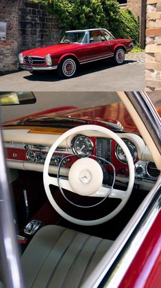 the interior and dashboard of an old red car with white leather seats, in front of a brick building