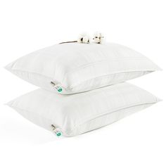 two pillows sitting on top of each other