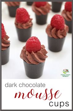 cupcakes with chocolate frosting and raspberries on top are featured in the dark chocolate mousse cups