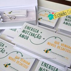 several business cards are stacked on top of each other in a box with the words energia motivvaco and nous destatios