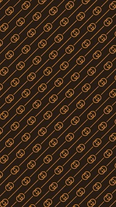 an orange and black background with circles