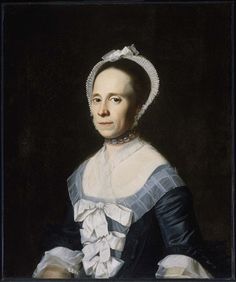 an old painting of a woman in blue and white dress with her hands on her hips