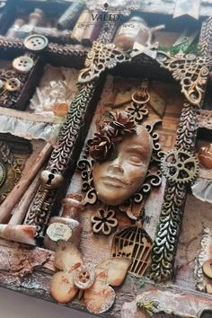 an altered photograph of a woman's face surrounded by buttons and other things on display