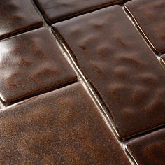 a close up view of some brown tiles