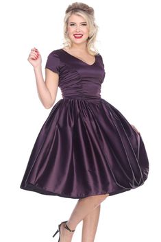 "Samples were made prior to 2016, ready to wear, made in USA,.   Evening Dress for Cocktails Mid Century style Color:  Dark Eggplant Purple Material:  Satin Size:  6 ~ Small Measures Bust 16\" fitting 32\" to 37\" and Waist 13\" fitting 25\"-27\" Very elegant color, perfect for holidays, Cocktails, Date Dinner or any reason to dress up,. Lots of gathers in the skirt, very heavy, short sleeves,   Retail price $150  Sale price Samples are final sales." Fitted Full Skirt Mini Dress For Party, Satin Pleated Skirt Cocktail Dress, Cocktail Satin Dress With Pleated Skirt, Satin Pleated Skirt Dress For Summer, Evening Dress With Lined Flared Skirt, Mini Party Dress With Gathered Skirt, Evening Dress With Pleated Waist And Flared Skirt, Fitted Satin Dress With Pleated Skirt, Party Mini Dress With Gathered Skirt