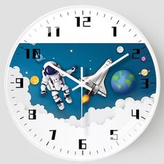 a clock with an astronaut floating on the moon and planets in the sky above it