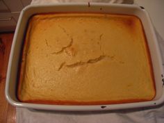 a square casserole dish is sitting on a table