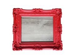 an ornate red frame on a white background