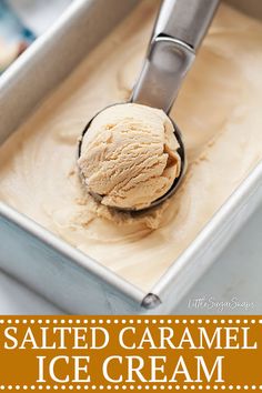 a scoop of salted caramel ice cream in a metal container with a spoon