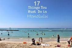 people are on the beach and in the water with text that reads 17 things you must do in honolulu