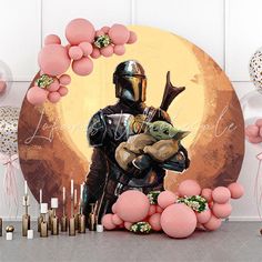 a star wars themed birthday party with pink balloons and confetti garlands on the table