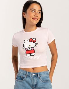 Sanrio Hello Kitty Happy Baby Tee. Large Graphic Screened On Front. Ribbed Crew Neckline. Short Sleeve. Shrunken Fit. 50% Cotton, 50% Polyester. Machine Wash. Imported. Model Is Wearing A Size Small. Model Measurements:height: 5'7" Bust: 34"waist: 25"hips: 34.5" Hello Kitty Crew Neck Top, Cute Hello Kitty Print Tops For Spring, Fitted Hello Kitty Crew Neck Top, Fitted Hello Kitty Top For Spring, Fitted Hello Kitty Tops For Spring, Spring Fitted Hello Kitty Tops, Fitted Pink Tops With Cartoon Print, Kawaii Hello Kitty Print Tops For Spring, Cute Hello Kitty Tops For Summer