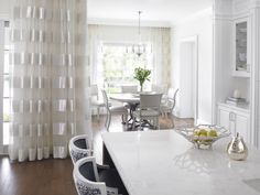 the kitchen is clean and ready to be used as a dining room or breakfast nook