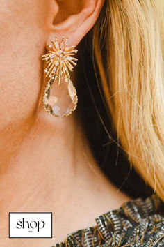 Looking to invest in quality fashion from brands you know and love? Add a touch of glitz with our Champagne Drop earrings. These beautiful pieces are the perfect accessory for weddings, date nights, or a night out with friends! The clear faceted quartz absorbs the color of your outfit to give a pop of color, accented with bursts of gold champagne specks. Find it here today and follow Shop How’d She Do That for more style inspo! Linen Crop Top, Gold Champagne, Linen Crops, Accessories Jewelry Earrings, Champagne Gold, Tropical Floral, Quality Fashion, Ring Bracelet, Earring Necklace