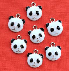 Panda bear silver tone charms, in a zinc alloy metal and enamel. Perfect for bracelets, pendants, earrings, zipper pulls, bookmarks and key chains! Measurements: 24mm x 20mmHole Size: 2mm You will receive 5 charms. Need more? Just send us a message through the contact us form, instant chat, or at mailto:info@bohemianfindings.com. Bulk pricing is available! All of our products are lead free and nickel safe. As they contain small parts, all items are for adult jewelry/craft making use only, not in Enamel Charms, Panda Bear, Olaf The Snowman, Crafts To Make, Jewelry Crafts, Silver Tone, Gold Plate, Charms, Plating