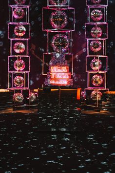 the stage is set up for a show with many lights on it and several clocks