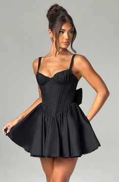 The perfect dress for date nights with the prettiest silhouette, Josie is cut from our premium cotton blend with flirty lace trims to the bust and skirt. With an oversized bow to the back, this flirty design has a boned bodice for the ultimate snatched waist, which is a pretty contrast to the super full skirt. 



Colour: Black.

Premium non-stretch cotton blend fabric.

Fully lined.

Delicate lace trims.

Piping on bodice.

Boning in corset for snatched waist.

Gathered, underwired cups.

Tie b Mini Corset Dress, Dress For Party, Mini Dresses Summer, Corset Dress, Spaghetti Strap Dresses, Glamorous Evening Gowns, Flowing Maxi Dress, Deep V Neck, Fashion Sense