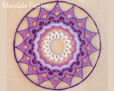 a circular doily made with crochet is shown in the shape of a flower