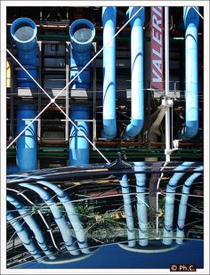 the reflection of pipes in the water