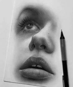 a pencil drawing of a woman's face