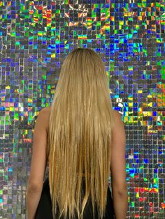 Unlock your diva status with our exclusive 7 piece set of 22 inch long blonde synthetic hair extensions that dazzle with holographic tinsel - a slay-worthy look that's sure to turn heads! Take your style to new heights when you clip in these luxurious locks and live your ultimate blonde fantasy. 22" inches Layered ends for a natural look Honey blonde color with blended holographic tinsel Snag resistant snap clip closure Seven extensions sections per pack Material: Polyester fiber tinsel Festival Glitter, Face Jewels, Ponytail Extension, Synthetic Hair Extensions, Clip In Extensions, Snap Clips, Honey Blonde, Blonde Bombshell, Blonde Color