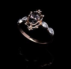 Materials; 14 carat Rose Gold, 1.90 grams, 0.10 ct Diamond F SI 0.75 ct Smoky Tourmaline. Indulge in the exquisite allure of this rose gold ring, meticulously crafted and adorned with a captivating smoky tourmaline and a radiant array of diamonds. Beyond a mere piece of jewelry, this ring is an embodiment of grace and luxury, tailored for those who have an eye for the extraordinary. At its core, this exceptional ring spotlights a smoky tourmaline, chosen for its captivating blend of earthy hues. Earthy Ring, Earthy Rings, Earthy Hues, Rose Gold Band, Tourmaline Ring, Ring Diamond, Center Stage, Gold Band, Rings Statement