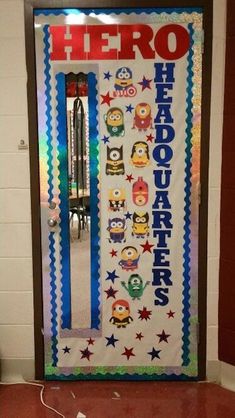 a door decorated with the words hero and minion characters in front of a school hallway