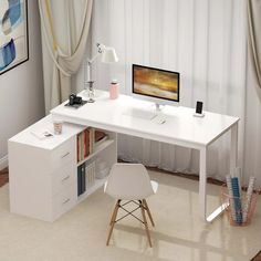 a white desk with a computer on top of it