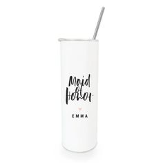 a white cup with a straw in it and the words madd horton on it