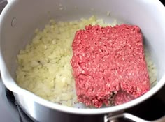 ground beef and onions cooking in a pot