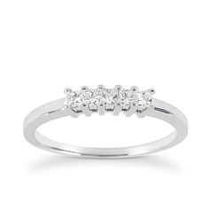 three stone diamond ring in white gold