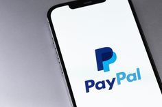 the paypal logo is displayed on an iphone