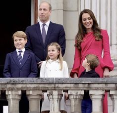 the royal family are posing for pictures on the balcony