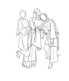 three women in robes are standing next to each other