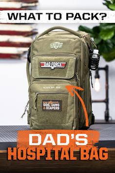 an army green backpack with the words dad's hospital bag on it and what to pack?