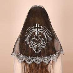 Follow us on ins, and give out coupons from time to time. https://www.instagram.com/mantveils/ Our exquisite Mantilla D-Shaped Veil with Embroidered Sacred Heart Cross and Scalloped Edge, a truly stunning and reverent headpiece that will elevate your spiritual experience. Crafted with love and devotion, this one-piece veil is designed in a classic D-shape to provide excellent coverage while maintaining a sense of grace and elegance. The centerpiece of this veil is the intricately embroidered Sacred Heart Cross, a powerful symbol of love, devotion, and faith. The beautiful cross design adds a touch of reverence to your attire, serving as a visual reminder of your spiritual connection. The delicate embroidery is a testament to the care and craftsmanship put into every detail of this veil. Me Cap Veil, Goth Wedding, Spiritual Experience, Cross Designs, Draped Fabric, Grunge Style