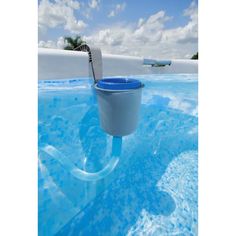 a bucket in the middle of a swimming pool