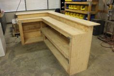 an unfinished workbench in a garage