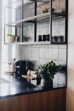 the kitchen counter is clean and ready to be used as a coffee shop or restaurant