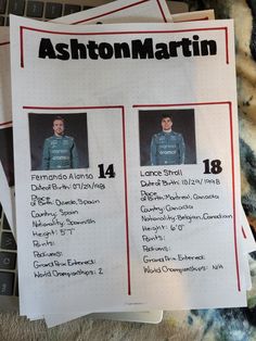 two sheets of paper that have been placed on top of a computer keyboard, with the names and numbers of each team